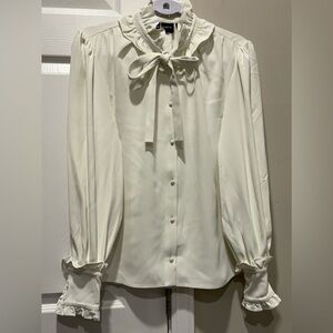 RETROFÊTE ruffled tie neck blouse in ivory Sz XS